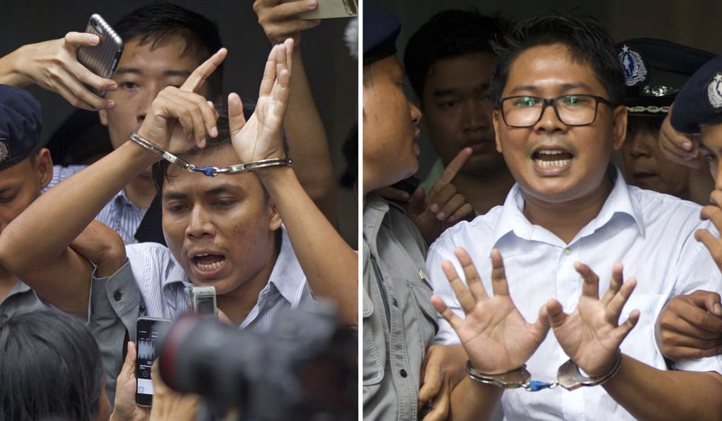 Reuters journalists Kyaw Soe Oo and Wa Lone were jailed for seven years on state secrets charges. Photo: AP Reuters journalists Kyaw Soe Oo and Wa Lone were jailed for seven years on state secrets charges. Photo: AP