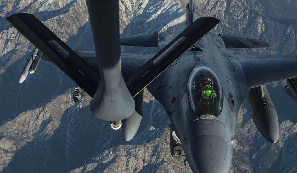 File photo of a US Air Force KC-135 Stratotanker refuels an F-16 Fighting Falcon over Afghanistan. Photo: AFP