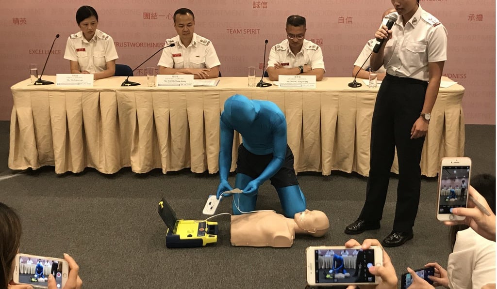 Mascot ‘Anyone’ offers advice on fire prevention, first aid, and escaping a blaze. Photo: Christy Leung