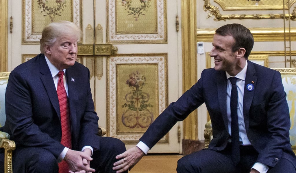 French President Emmanuel Macron pats US President Donald Trump on the leg during their meeting at the Elysee palace in Paris. Photo: EPA French President Emmanuel Macron pats US President Donald Trump on the leg during their meeting at the Elysee palace in Paris. Photo: EPA