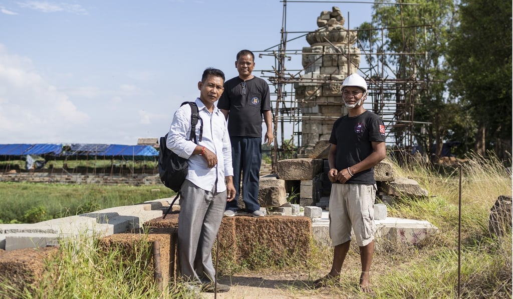 Chin Sophal, Din Lida, and Morm Pum had been working full-time on restoring the West Mebon temple at Angkor before funding was stopped. Photo: Enric Catala