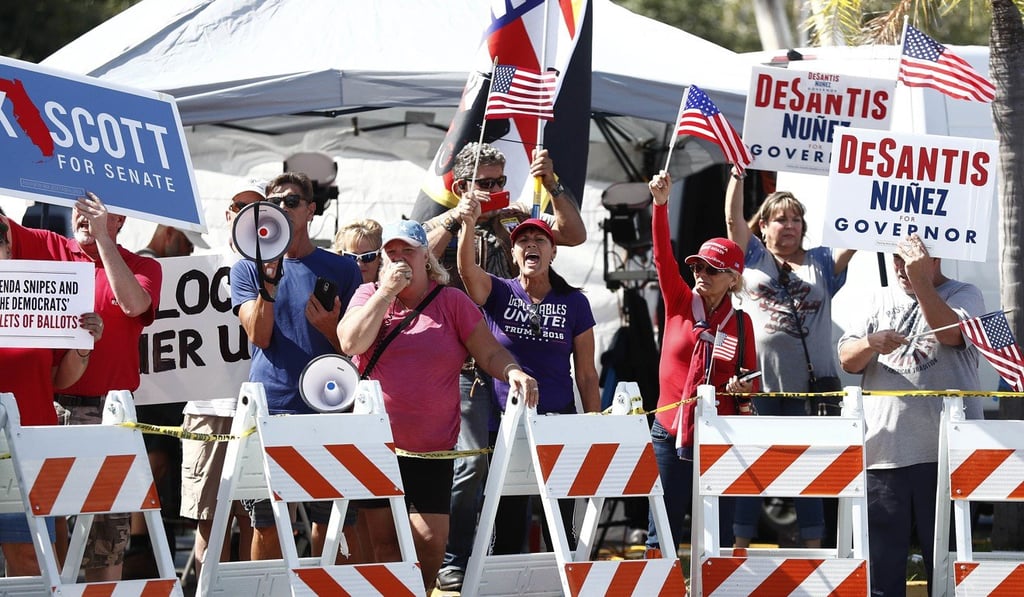 Protesters gather outside the Broward County Supervisor of Elections office. Photo: AP Photo Protesters gather outside the Broward County Supervisor of Elections office. Photo: AP Photo