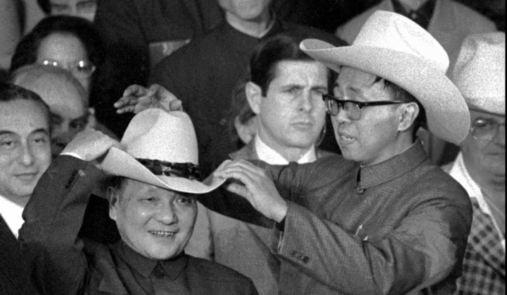 An aide helps Deng Xiaoping, then China’s vice-premier, try on a cowboy hat presented to him at a rodeo in Simonton, Texas, on February 2, 1979. Photo: AP