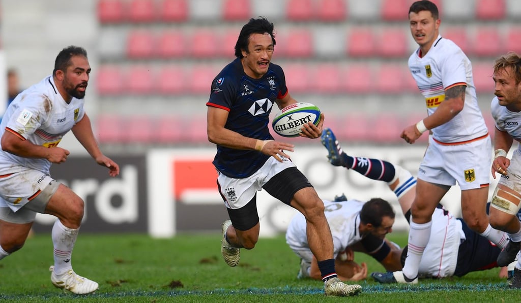Winger Salom Yiu Kam-shing bursts through the German defence.