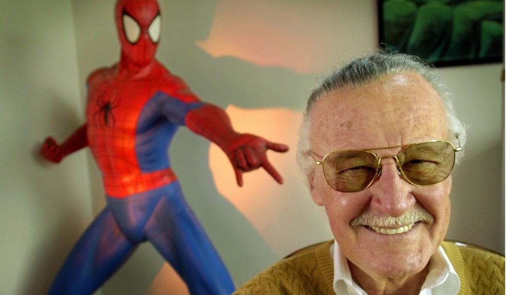 Stan Lee smiles during a photo session in 2002, in his office in Santa Monica, California. Photo: AP