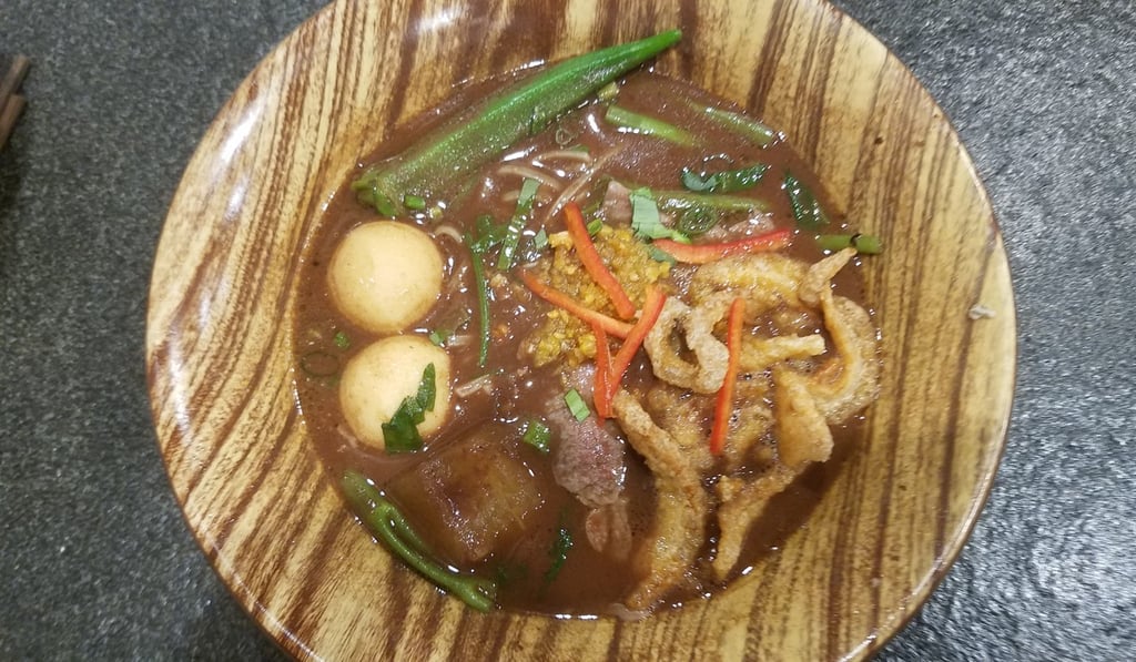 Japanese Hida wagyu beef boat soup with pad Thai noodles. Photo: Martin Choi