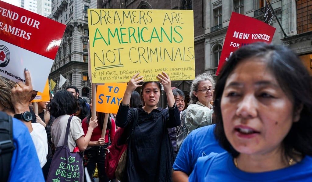 Protesters shout slogans against US President Donald Trump during a demonstration in support of the DACA programme, near Trump Tower in New York on October 5, 2017. Photo: AFP