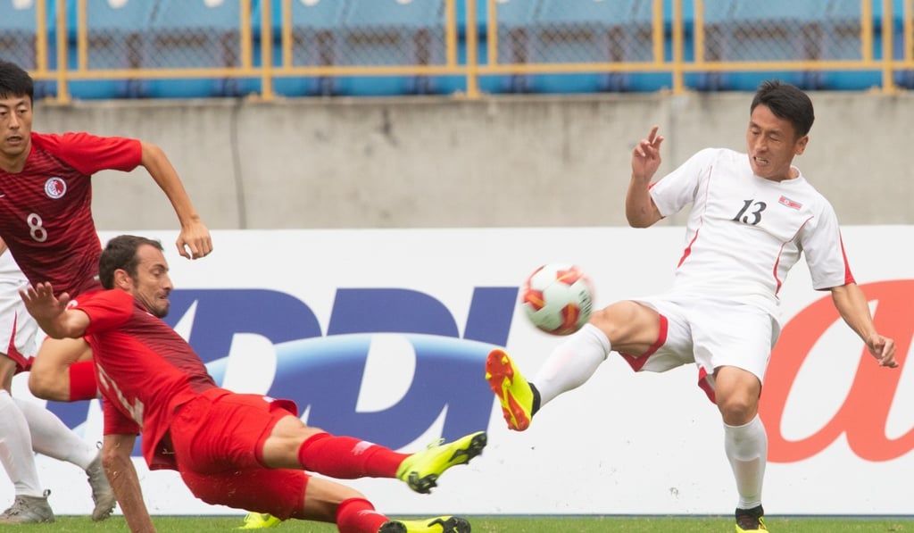 Hong Kong and North Korea battle it out in the 0-0 draw.