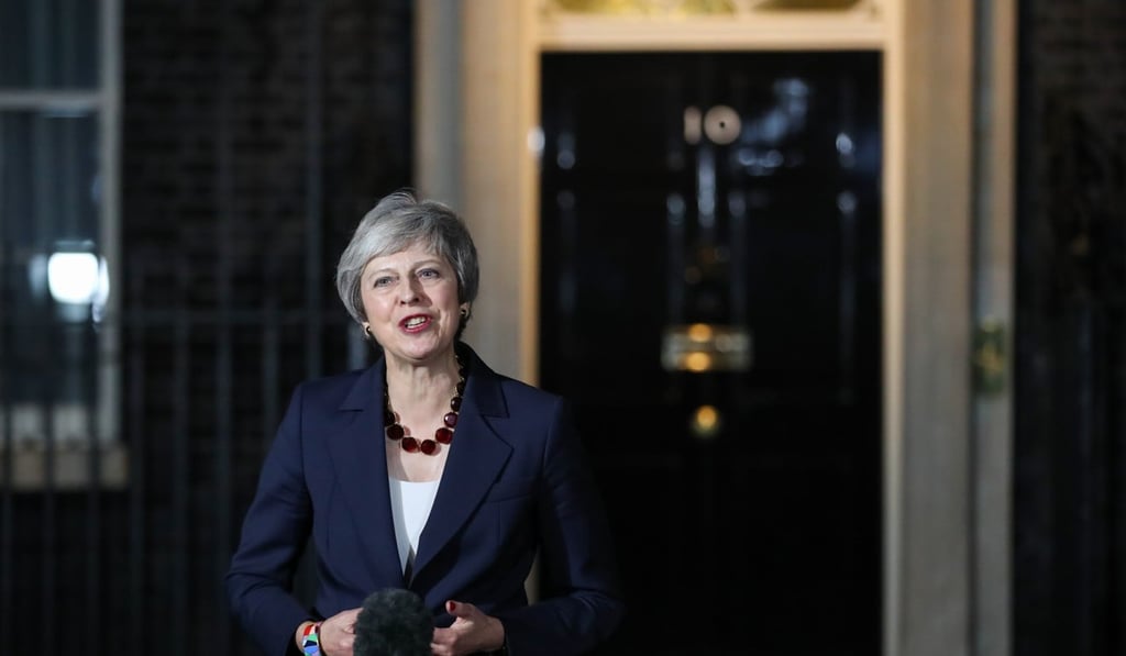 UK Prime Minister Theresa May delivers a statement, following a marathon special session of Cabinet to discuss the Brexit deal, outside 10 Downing Street in London on Wednesday. Photo: Bloomberg UK Prime Minister Theresa May delivers a statement, following a marathon special session of Cabinet to discuss the Brexit deal, outside 10 Downing Street in London on Wednesday. Photo: Bloomberg