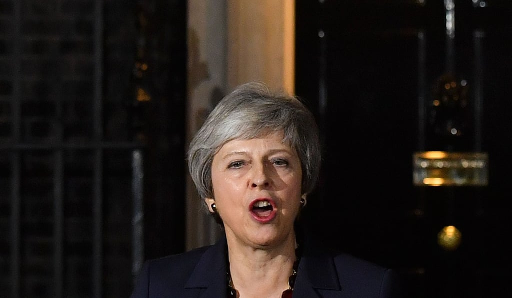 Britain's Prime Minister Theresa May gives a statement outside 10 Downing Street in London on Wednesday. Photo: Agence France-Presse