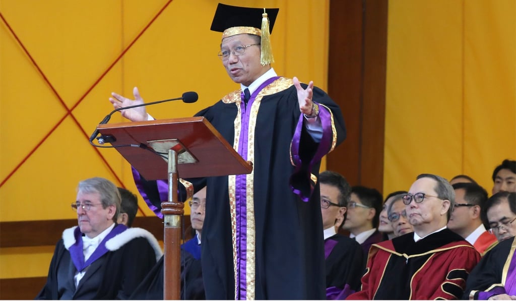 Just before university vice chancellor Professor Rocky Tuan Sung-chi began a speech, a group staged a demonstration against national anthem legislation. Photo: Felix Wong