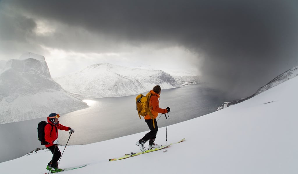 A pair enjoy some ski touring in Senja, Norway. Photo: Alf Alderson