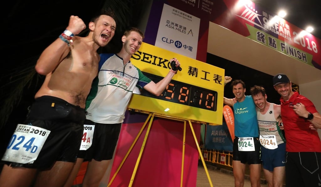(From Left): John Ellis, Brian McFlynn, Michael Skobierski, Jeff Campbell, and coach David Jacquier celebrate. The finished in 11 hours 53 minutes.