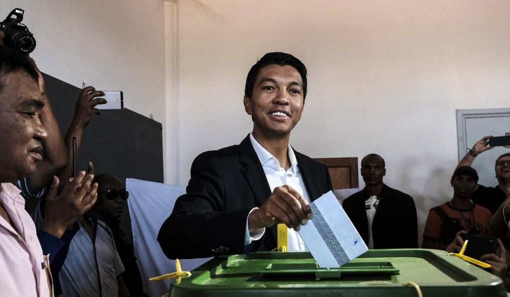 Presidential hopeful Andry Rajoelina, casts his vote at a polling station in Antananarivo, Madagascar. Photo: AP Photo