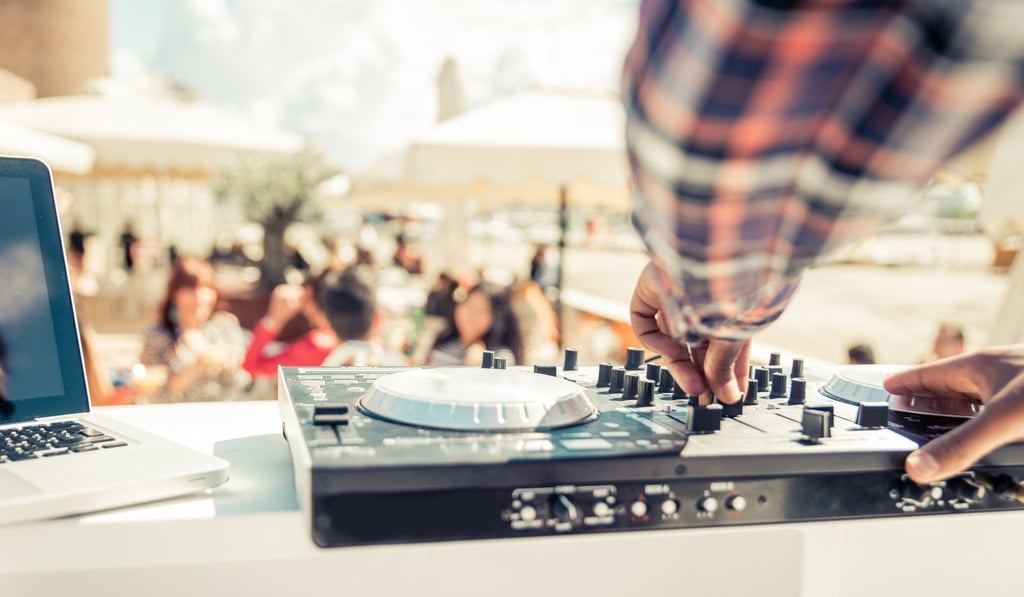 Having the right music playing is the most effective way to get a crowd into the mood to dance. Photo: Shutterstock
