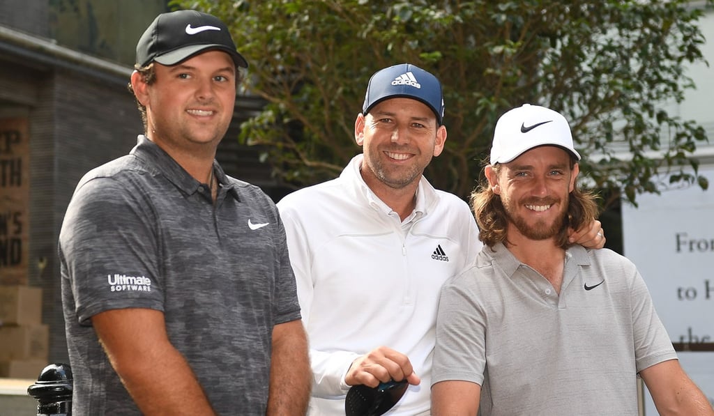 Patrick Reed, Sergio Garcia and Tommy Fleetwood in Pottinger Street, Central, on Tuesday. Photo: Richard Castka Patrick Reed, Sergio Garcia and Tommy Fleetwood in Pottinger Street, Central, on Tuesday. Photo: Richard Castka