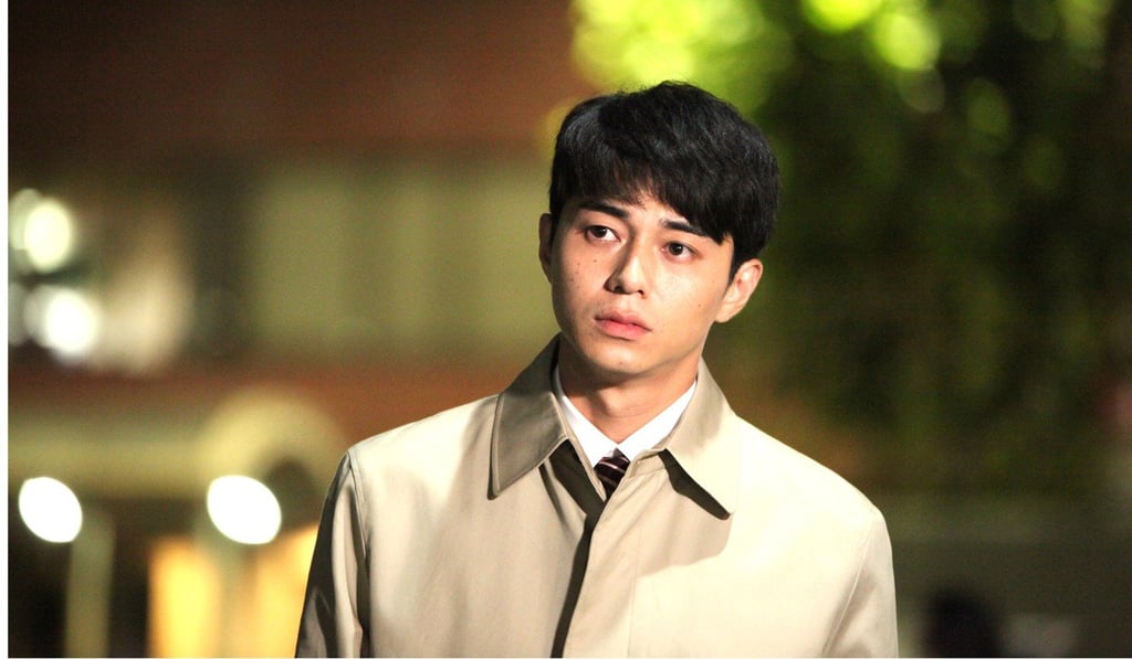 Masahiro Higashide in a still from Asako I & II. Masahiro Higashide in a still from Asako I & II.