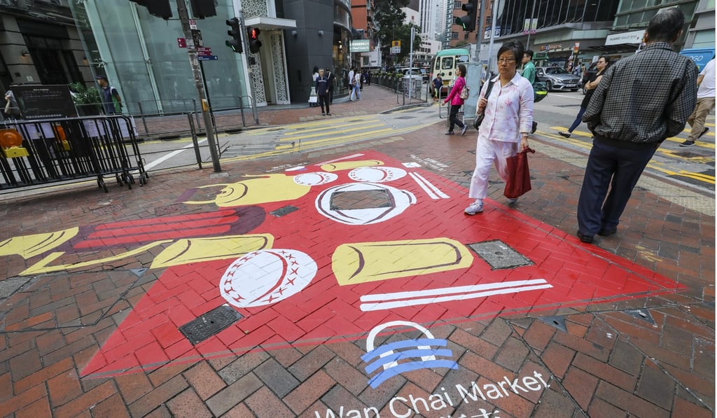 A pavement artwork on Stone Nullah Lane in Wan Chai. Photo: Dickson Lee A pavement artwork on Stone Nullah Lane in Wan Chai. Photo: Dickson Lee