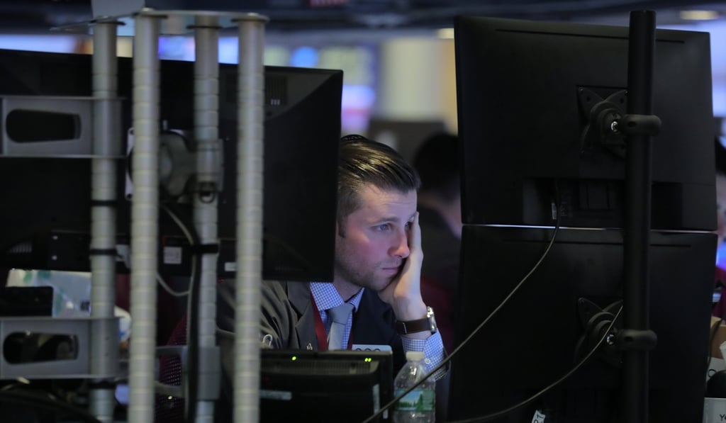 A trader on the floor of the New York Stock Exchange, where shares Photo: Reuters