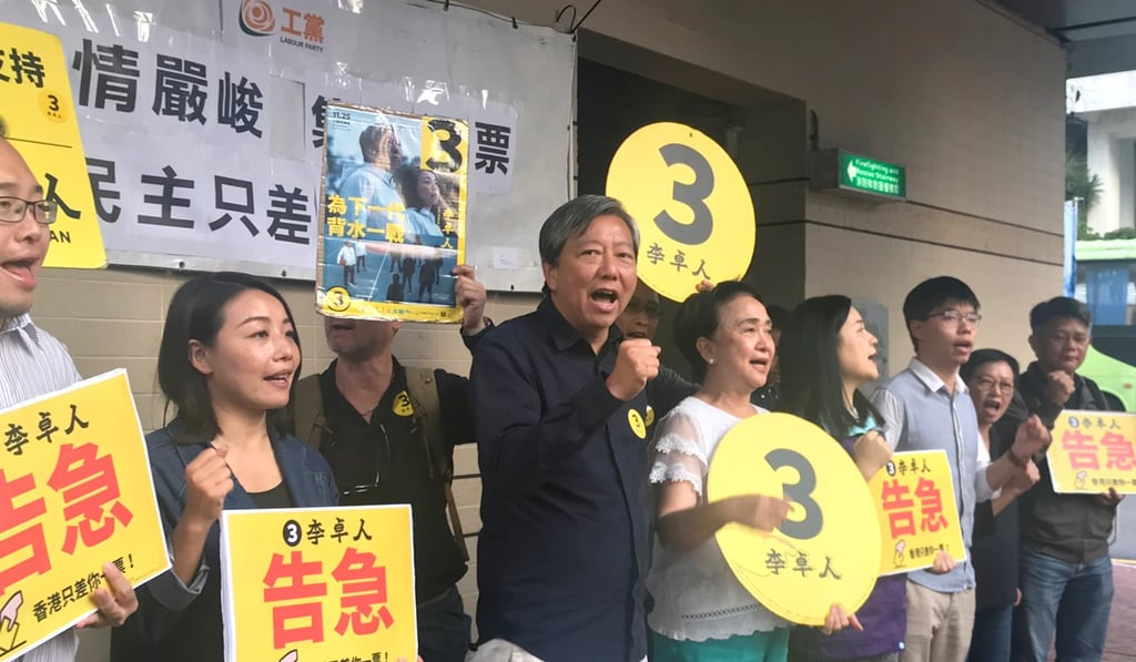 Disqualified lawmaker Lau Siu-lai (left), by-election candidate Lee Cheuk-yan (centre), and former Democratic Party chairwoman Emily Lau Wai-hing appear at a by-election rally. Photo: Kimmy Chung