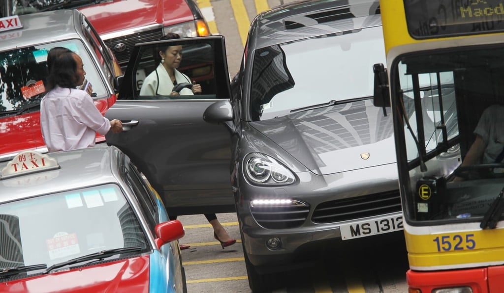 Illegal parking by private cars causes disruption to public transport. Photo: David Wong