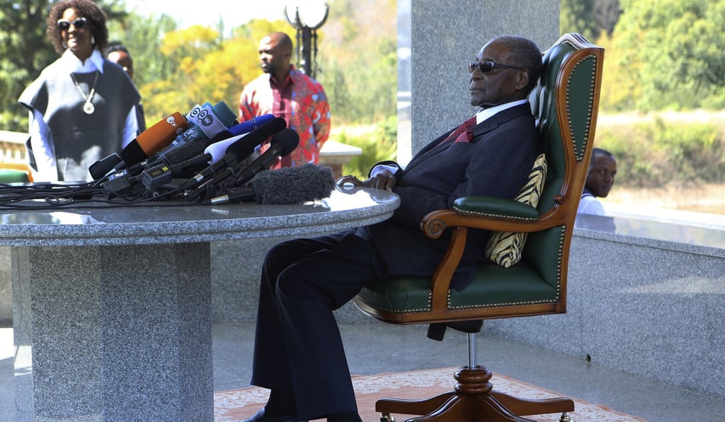 In a rare public appearance in July, Mugabe slumped behind a bank of microphones during a press conference. Photo: AP