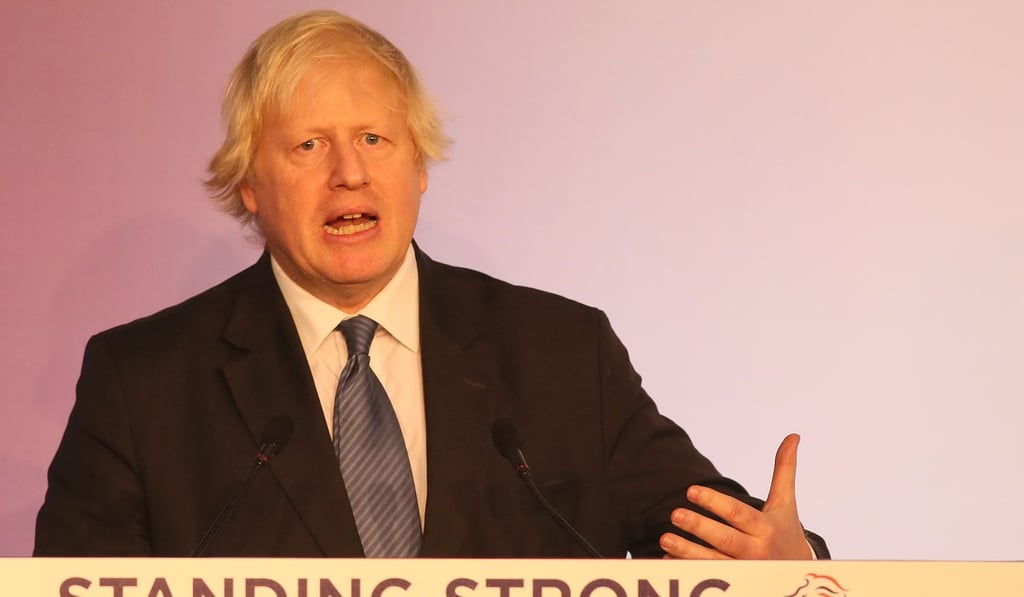 Former British Foreign Secretary Boris Johnson delivers a speech at the Democratic Unionist Party (DUP), Annual Conference in Belfast. Photo: AFP