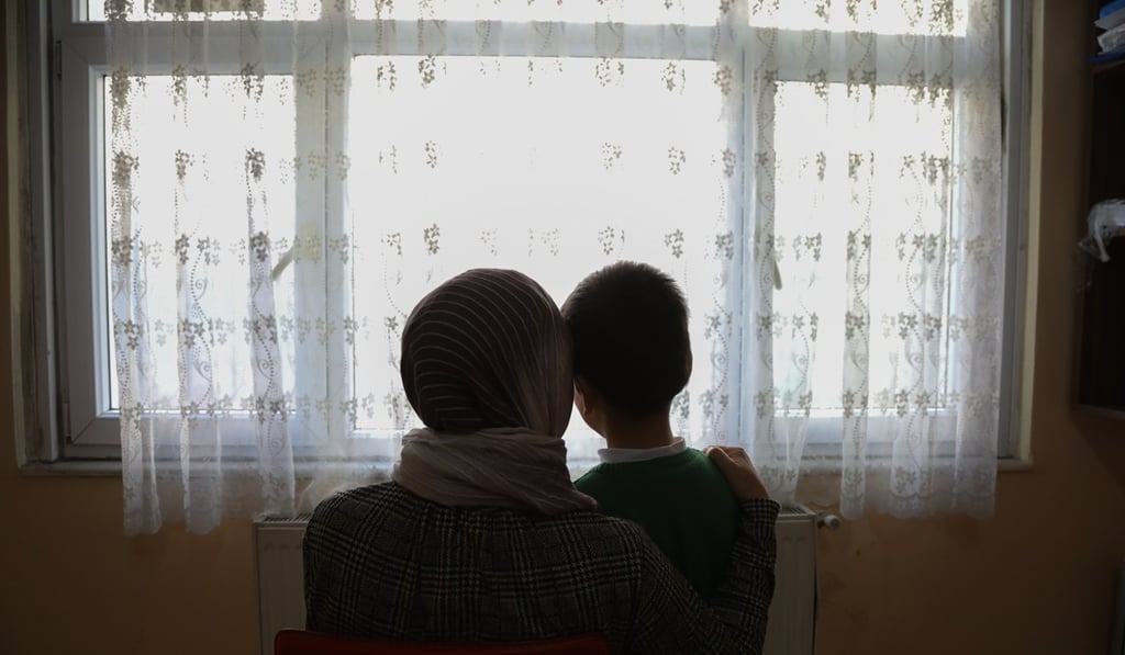 Asya Abliz and her eight-year-old son Shkur. Photo: Helene Franchineau