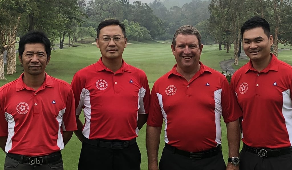 Ducky Tang (left), Danny Lai (second from left) and Tim Tang (right) from the HKGA with Gary Gilchrist (second from right) Photo: Sam Agars