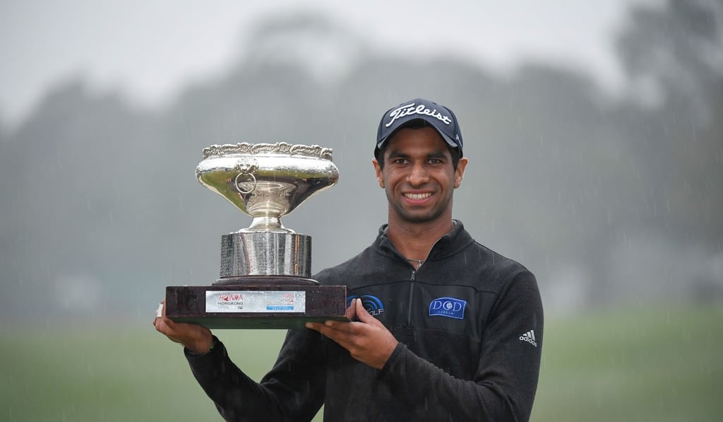Aaron Rai with the trophy after winning the Hong Kong Open. Photo: Richard Castka