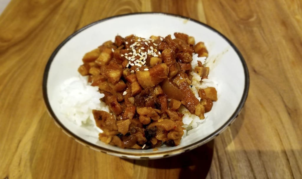 Pork rice at What to Eat. Photo: Martin Choi