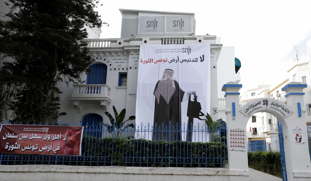 A poster depicting Saudi Crown Prince Mohammed bin Salman holding a chainsaw with an inscription ‘No to the desecration of Tunisia, the land of the revolution’ on the National Syndicate of Tunisian Journalists headquarters in Tunis, Tunisia on November 26, 2018. Photo: EPA A poster depicting Saudi Crown Prince Mohammed bin Salman holding a chainsaw with an inscription ‘No to the desecration of Tunisia, the land of the revolution’ on the National Syndicate of Tunisian Journalists headquarters in Tunis, Tunisia on November 26, 2018. Photo: EPA