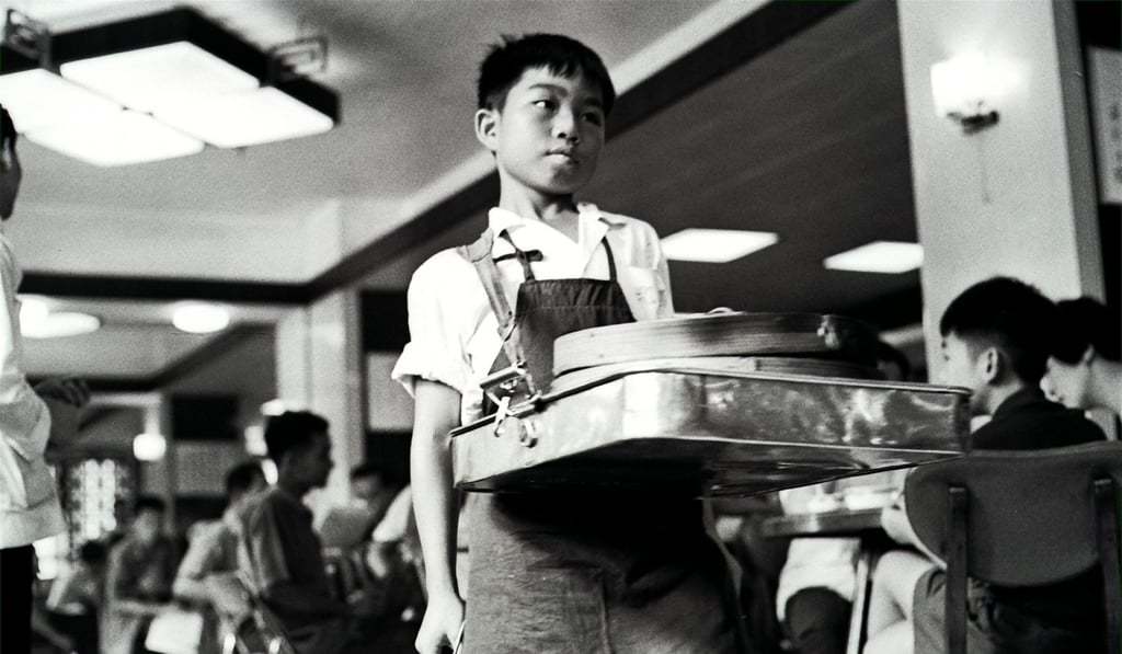 A youth selling dim sum in a restaurant instead of going to school in 1969. Photo: C.Y. Yu