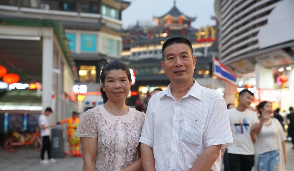 Wu Tao and his wife, Li Xinsong, have seen living conditions in Shenzhen change for the better. Photo: Lea Li