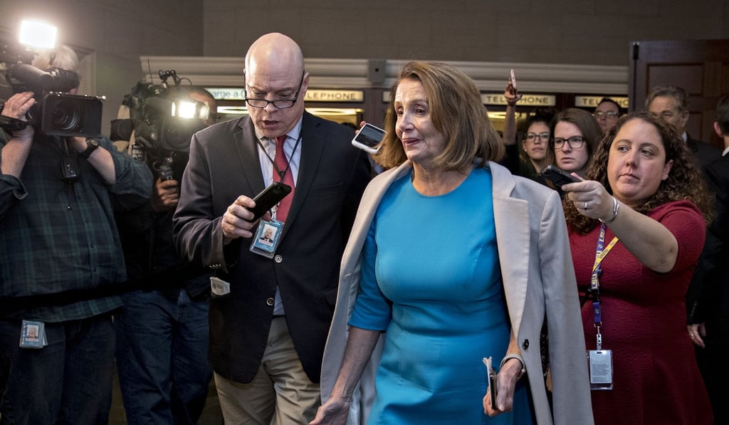 House Minority Leader Nancy Pelosi exits a Democratic caucus meeting in Washington on Wednesday. Photo: Bloomberg