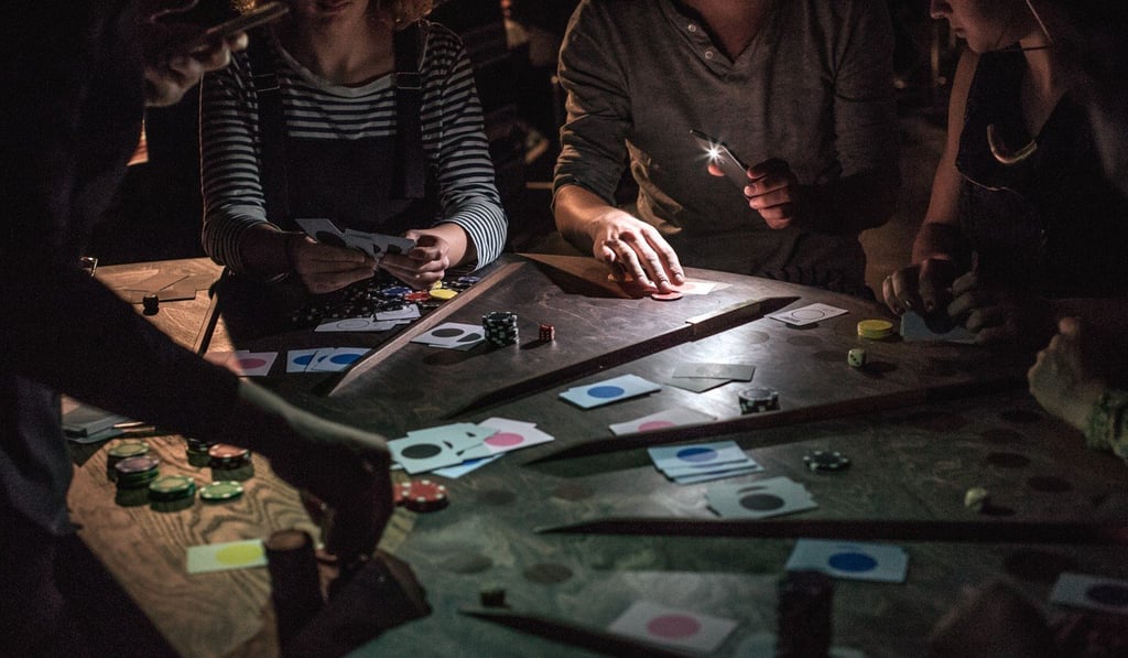 In theatre production ‘£¥€$’ (Lies) by Belgian theatre collective Ontroerend Goed, members of the audience are invited to be among the “players”. Photo: Michiel Devijver In theatre production ‘£¥€$’ (Lies) by Belgian theatre collective Ontroerend Goed, members of the audience are invited to be among the “players”. Photo: Michiel Devijver