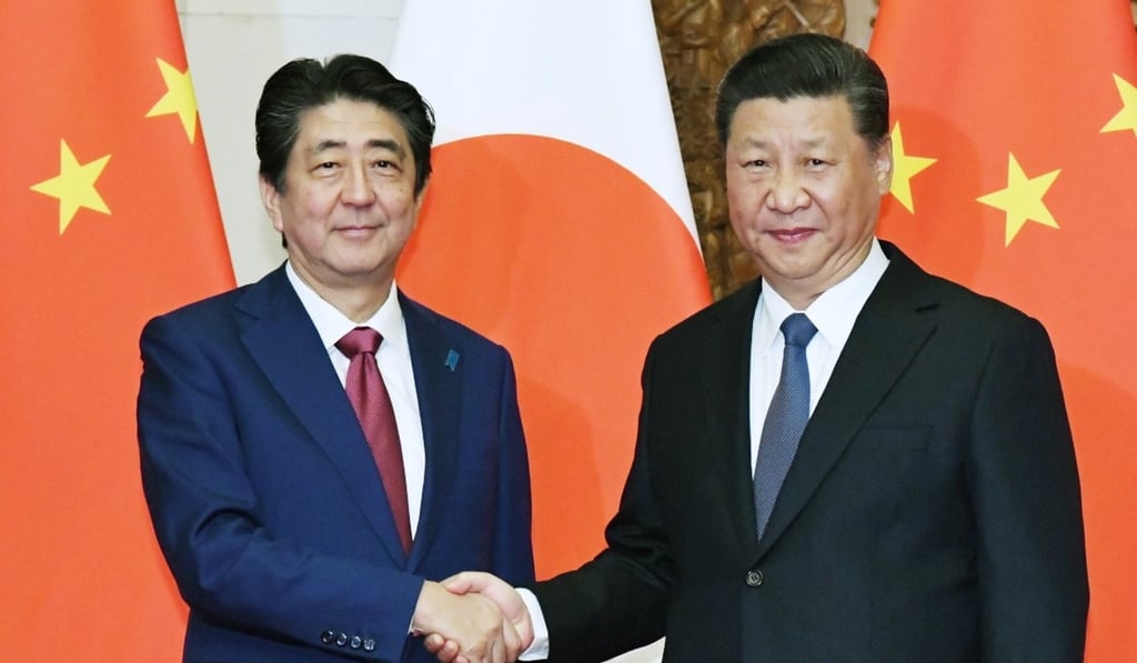 Japanese Prime Minister Shinzo Abe meets Xi in October. Photo: EPA