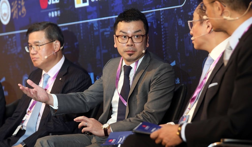 Denis Ma (centre), head of research, Hong Kong, JLL, speaking at the Redefining Hong Kong Debate Series – Greater Bay Area panel, at the J W Marriott Hong Kong in Admiralty. Photo: Xiaomei Chen
