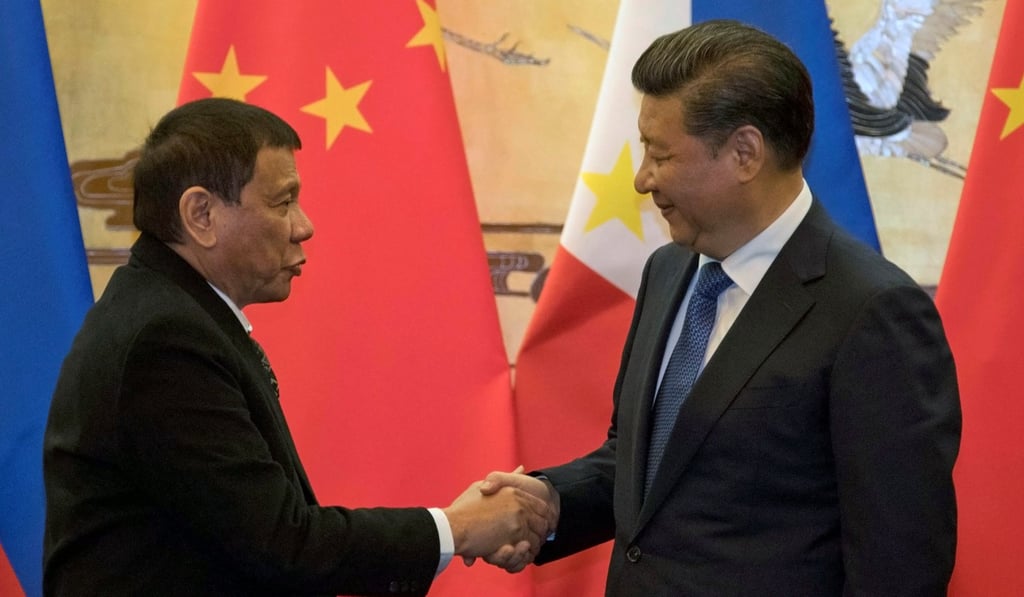 Talks were said to be held in a “friendly” atmosphere when Rodrigo Duterte (left) met Xi Jinping in 2016. Photo: Reuters