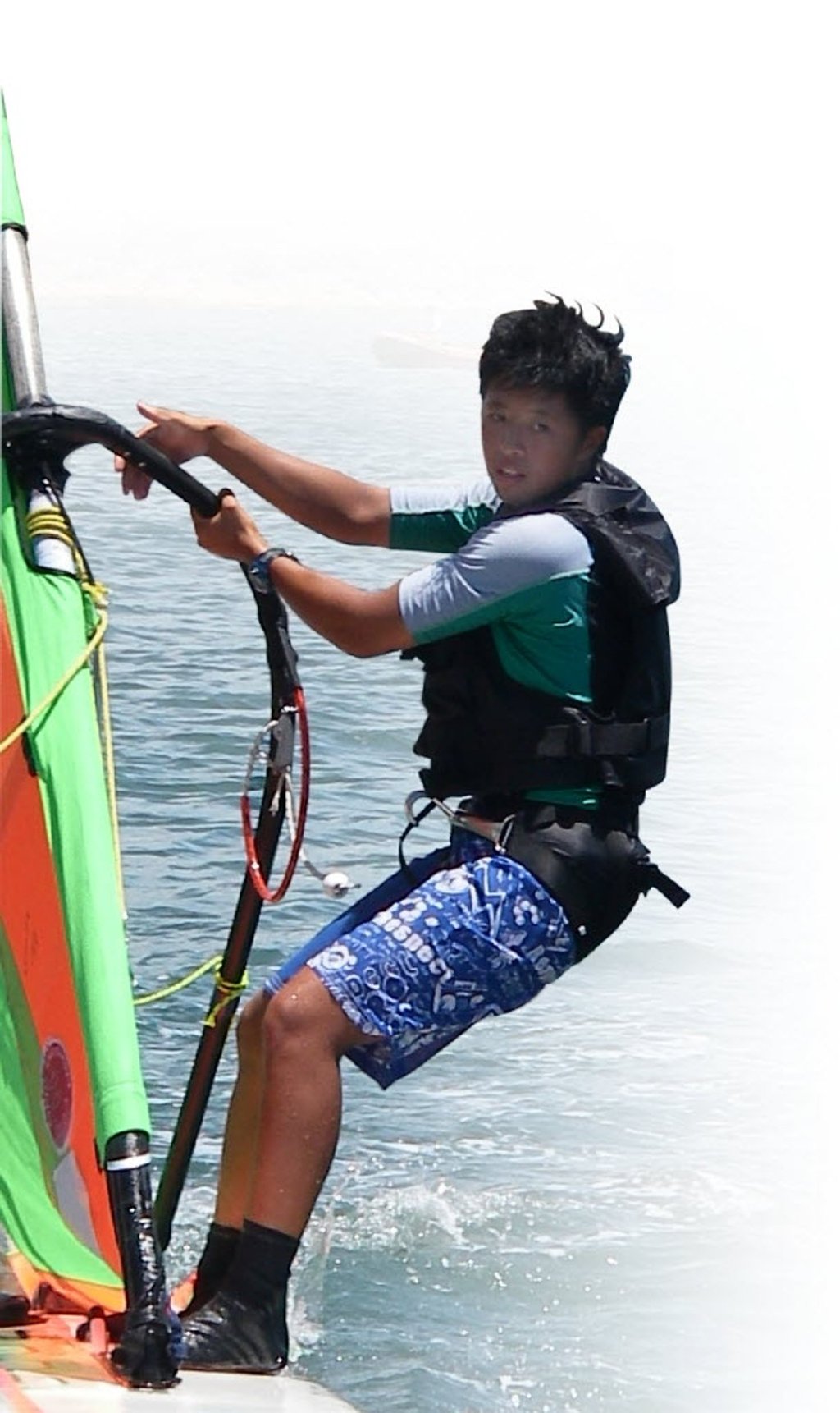 A 16-year-old Stephanie Chan windsurfing before her rugby career took off.