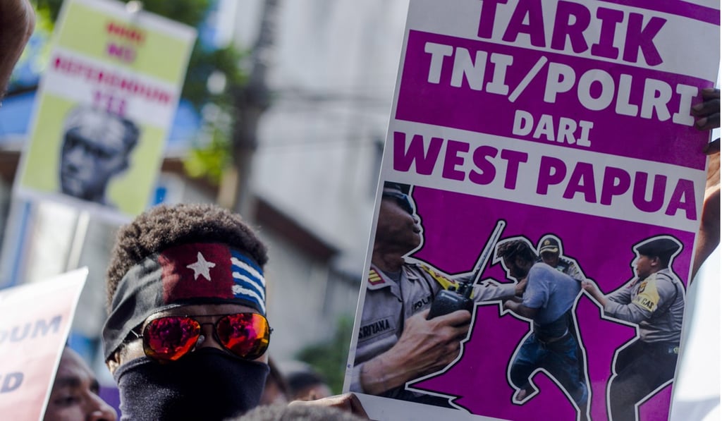 A Papuan student with a morning star flag headband at the rally in Surabaya. Photo: EPA A Papuan student with a morning star flag headband at the rally in Surabaya. Photo: EPA