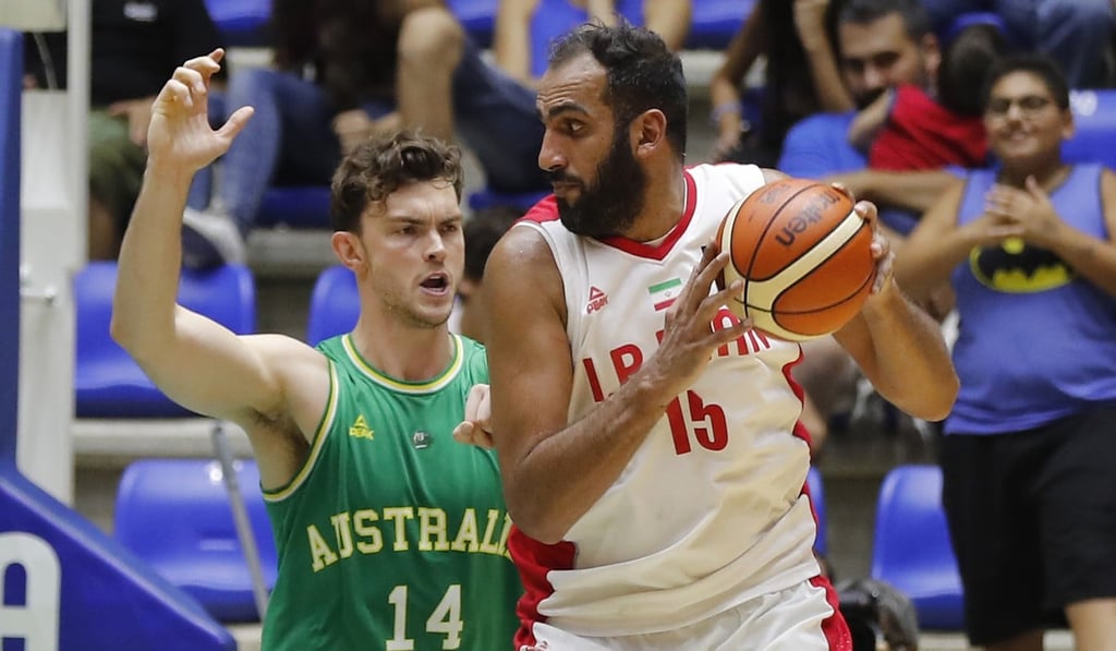 Iran’s Hamed Haddadi (right) is missing in action. Photo: AP