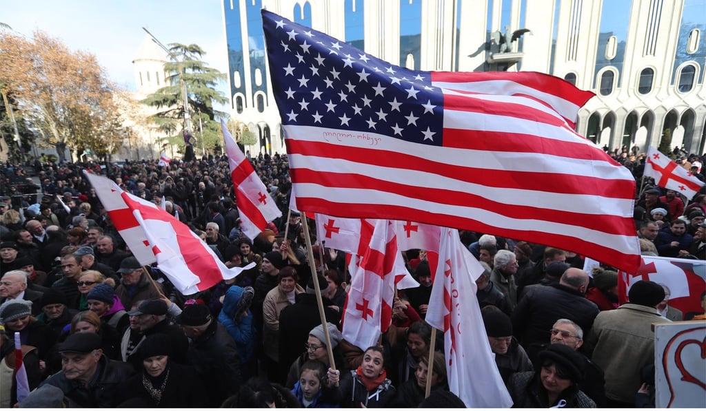 Supporters of Georgian opposition presidential candidate Grigol Vashadze at a protest in Tbilisi on December 2, 2018. Photo: EPA