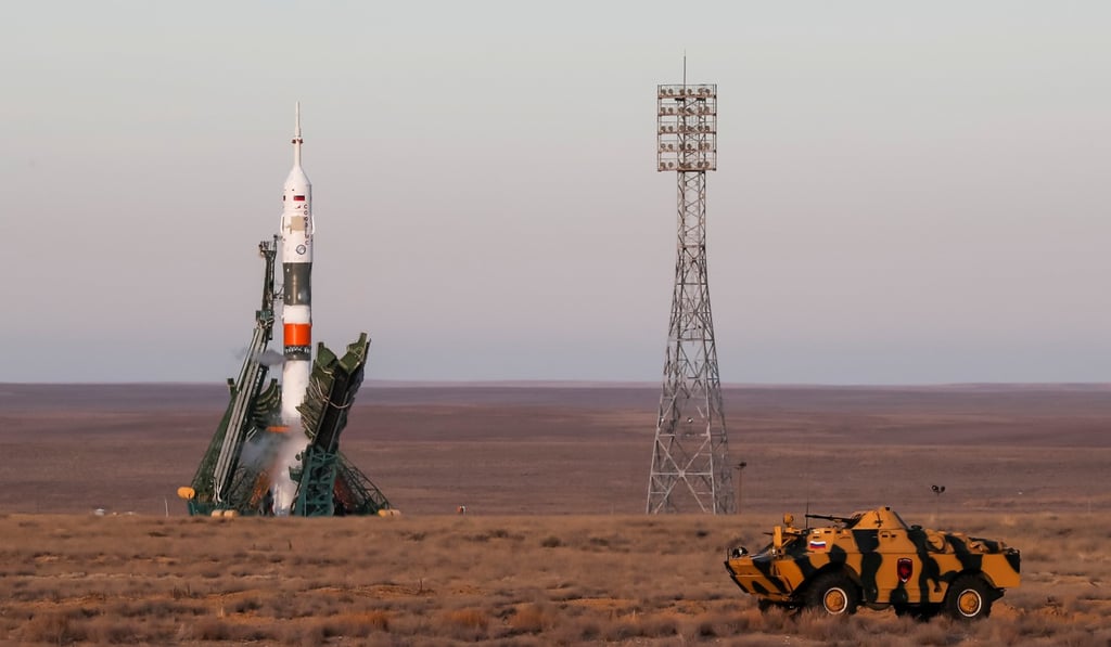 Security personnel ride in an armoured vehicle in front of the Soyuz MS-11 spacecraft soon before its launch at the Baikonur cosmodrome, Kazakhstan on December 3, 2018. Photo: Reuters