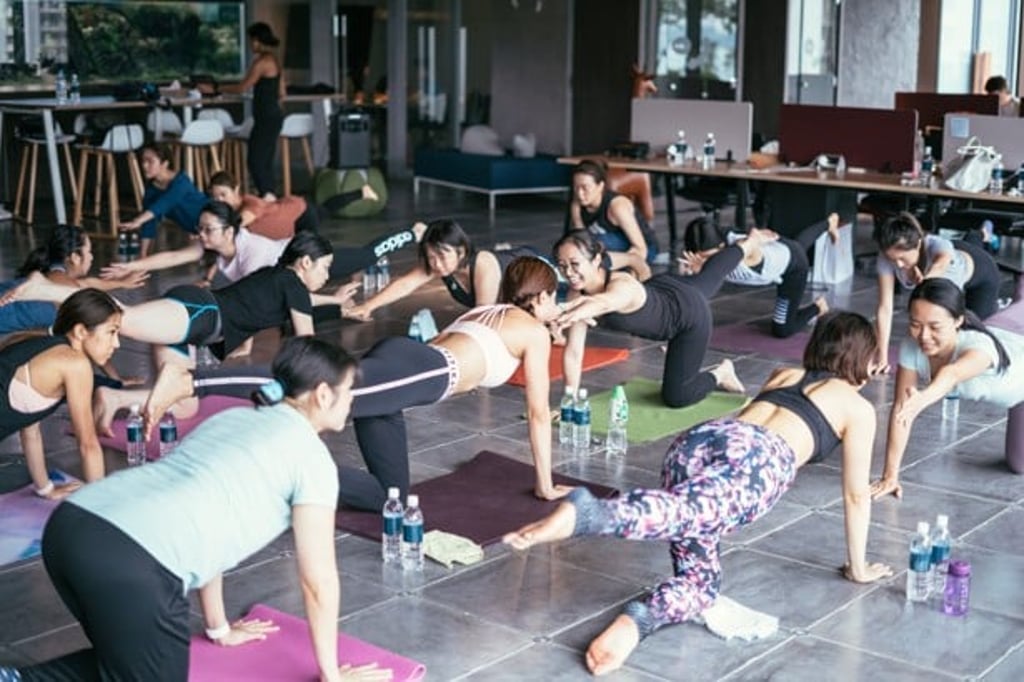 Yoga is very popular in Hong Kong, evidenced by packed classes at everything from large fitness chains to private studios. Photo: Conrad Leung