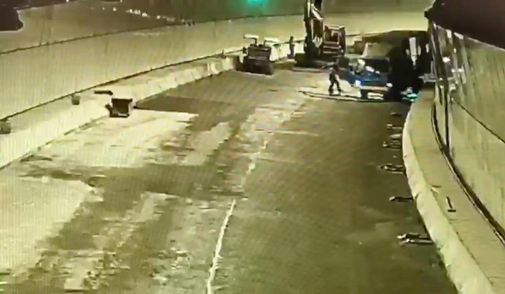 The driver tried to stop the truck rolling away by grabbing on to the door. Photo: Handout