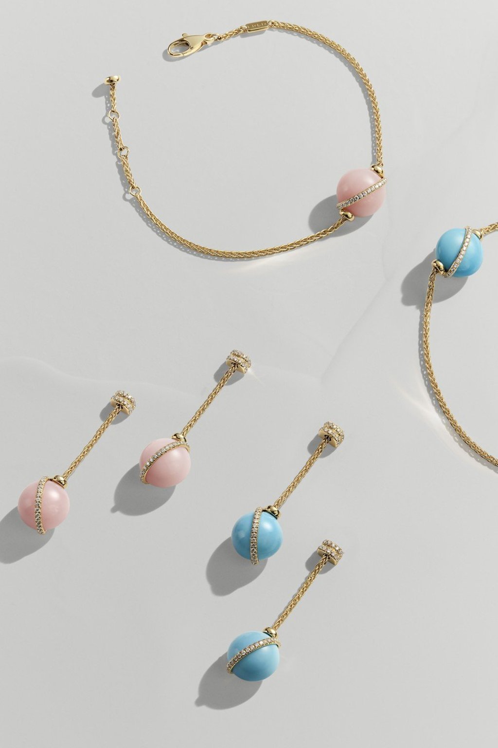Fred Baie des Anges dangling earrings and bracelet in yellow gold, palm chain, diamonds, pink opal and turquoise Fred Baie des Anges dangling earrings and bracelet in yellow gold, palm chain, diamonds, pink opal and turquoise