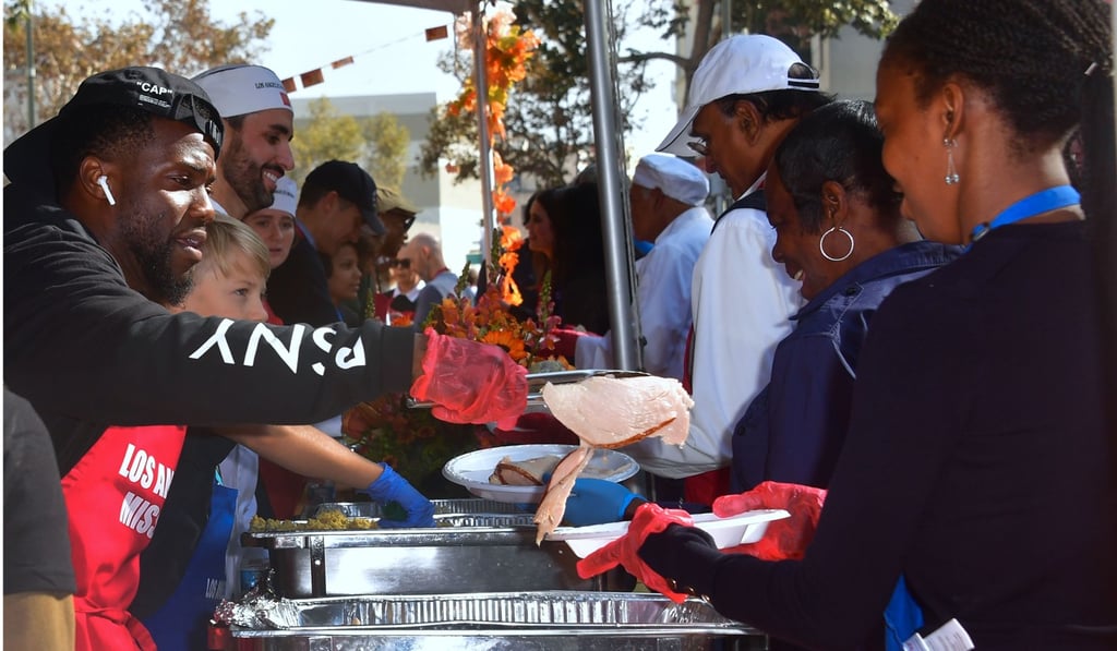 Kevin Hart volunteering at a Thanksgiving event for the homeless in Los Angeles, California on November 21, 2018. Photo: AFP Kevin Hart volunteering at a Thanksgiving event for the homeless in Los Angeles, California on November 21, 2018. Photo: AFP