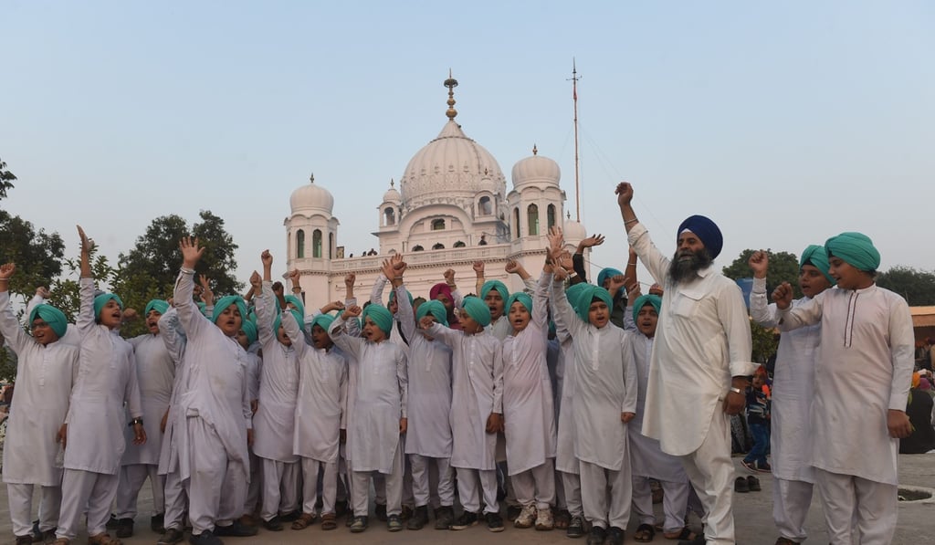Sikh children shout slogans in front of the Kartarpur Gurdwara Sahib after a groundbreaking ceremony for the Kartarpur Corridor between Indian and Pakistan on November 28. Photo: AFP