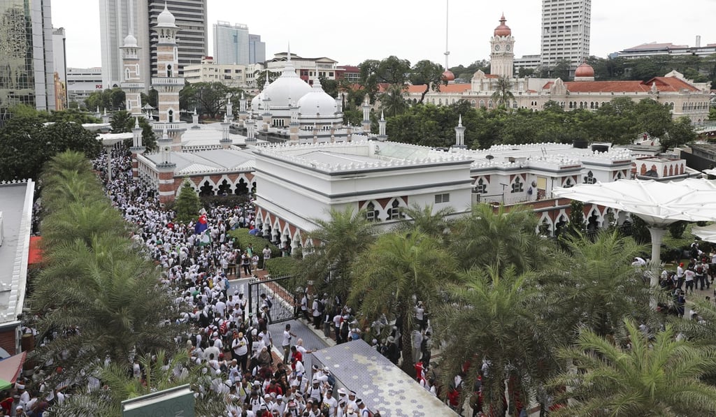 Tens of thousands took to the streets of the Malaysian capital. Photo: AP Tens of thousands took to the streets of the Malaysian capital. Photo: AP